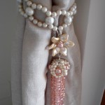 Pink pendulum tie back