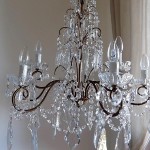 Italian vintage 9 arms solid brass chandelier with rare-shaped crystals Italian vintage 9 arms solid brass chandelier with rare-shaped crystals