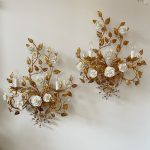 gold leaf sconces with white roses